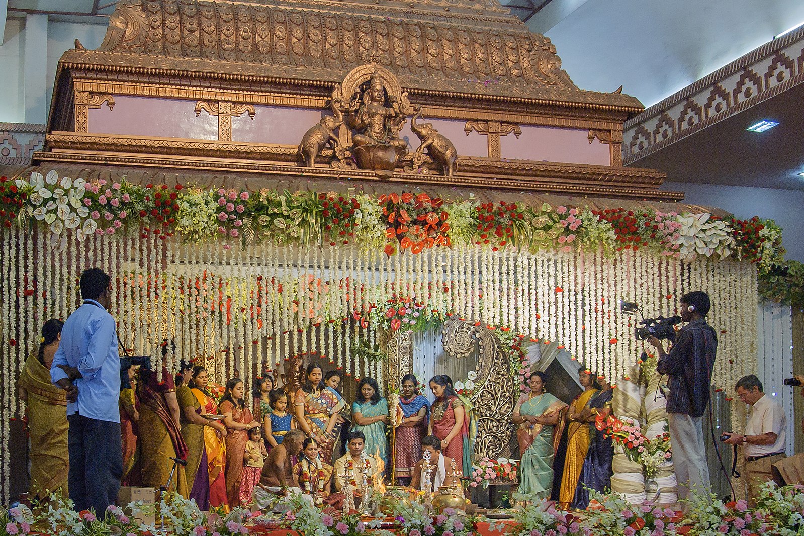 A 2010 wedding in Puducherry, Tamil Nadu, India. “A fancy Indian wedding taking place in Puducherry, Tamil Nadu, India”  Matthew T Rader, MatthewTRader.com, 2010, License CC-BY-SA 4.0